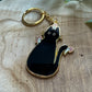 Porte-clés en métal émaillé Chat Noir & Champignons