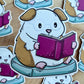 Autocollant découpé Reading Guinea Pig