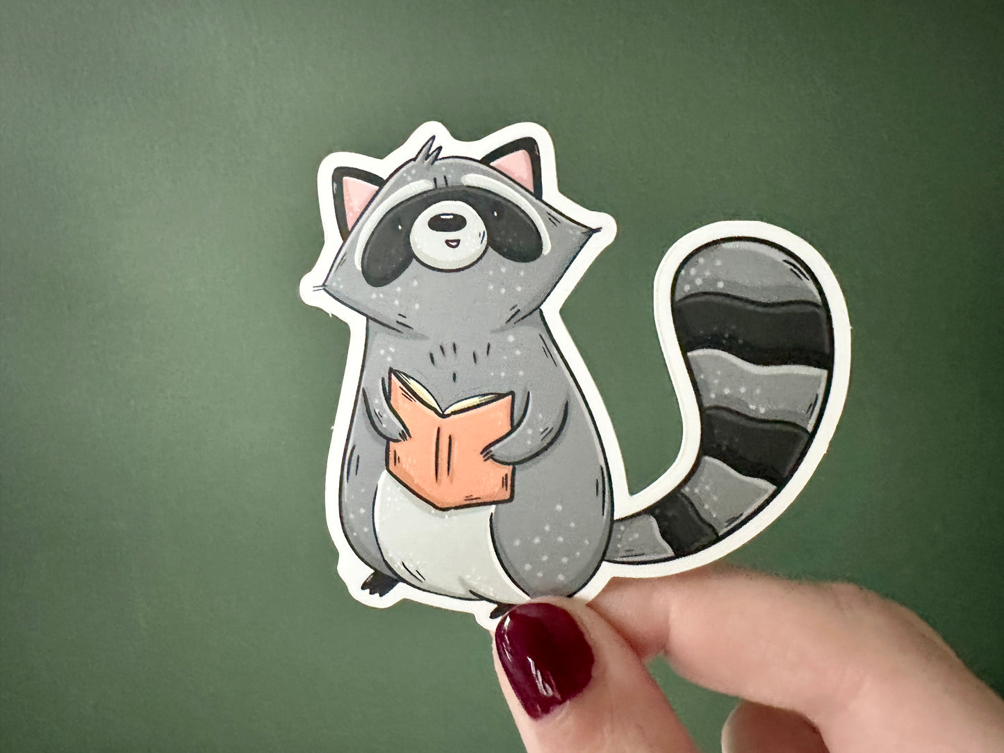 Reading Raccoon Die Cut Sticker